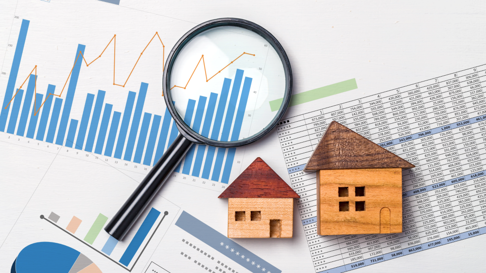 Real estate market analysis with houses and graphs