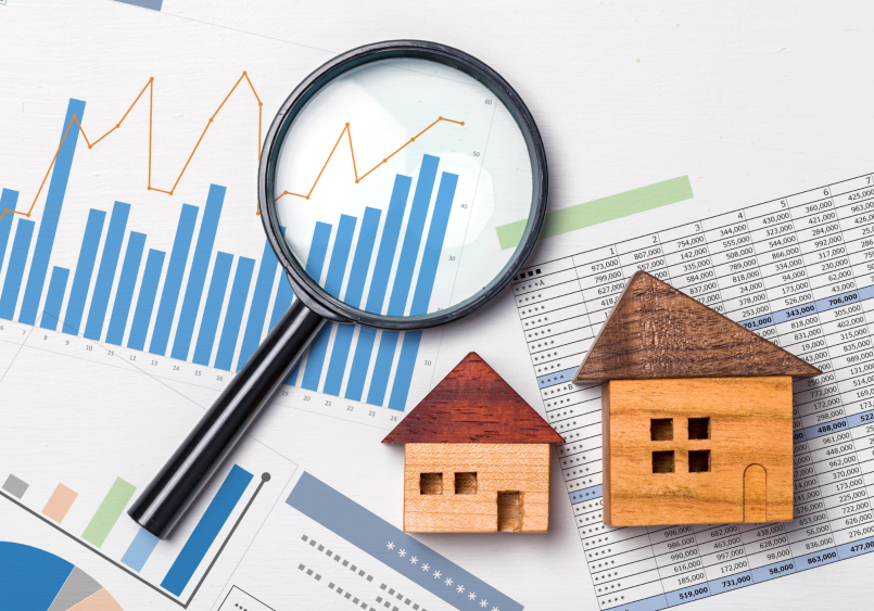 Real estate market analysis with houses and graphs